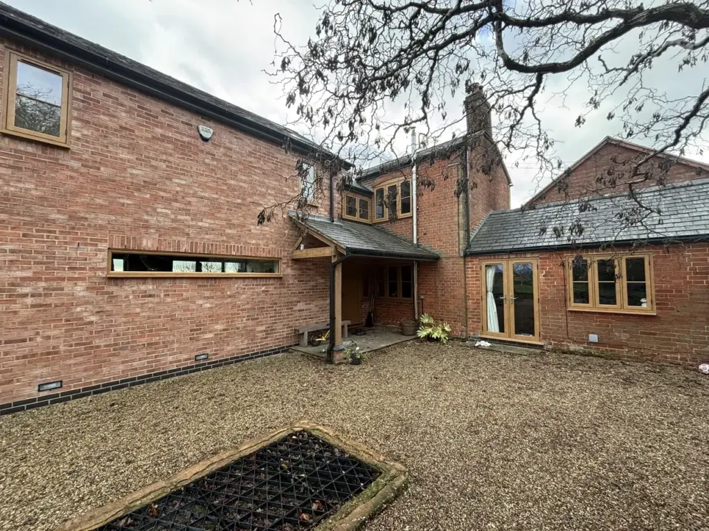 Residence 9 Windows in Irish Oak installed by Eco Windows in Dunchurch
