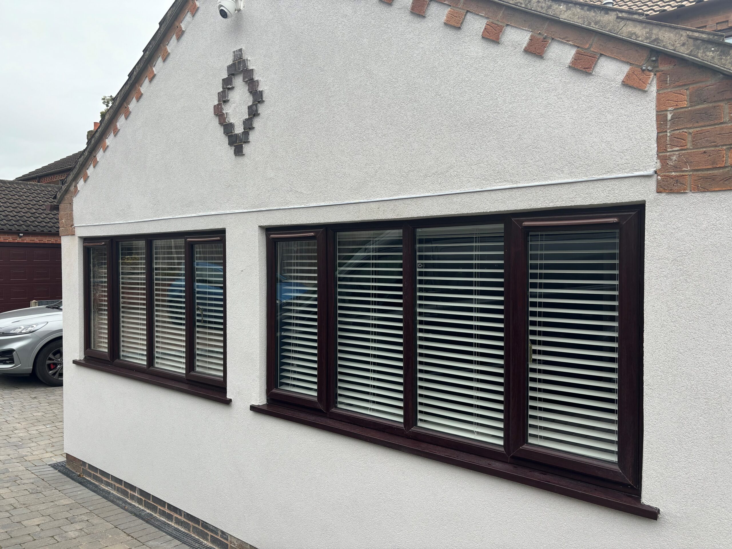 Rosewood on white window installed by Eco Windows