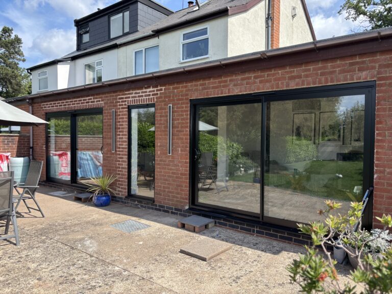 Black Aluminium Patio doors installed by Eco Windows