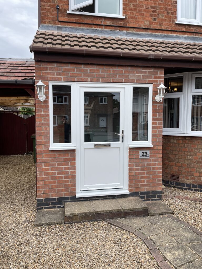 White-uPVC-door-installed-in-Leicester-by-Eco-Windows