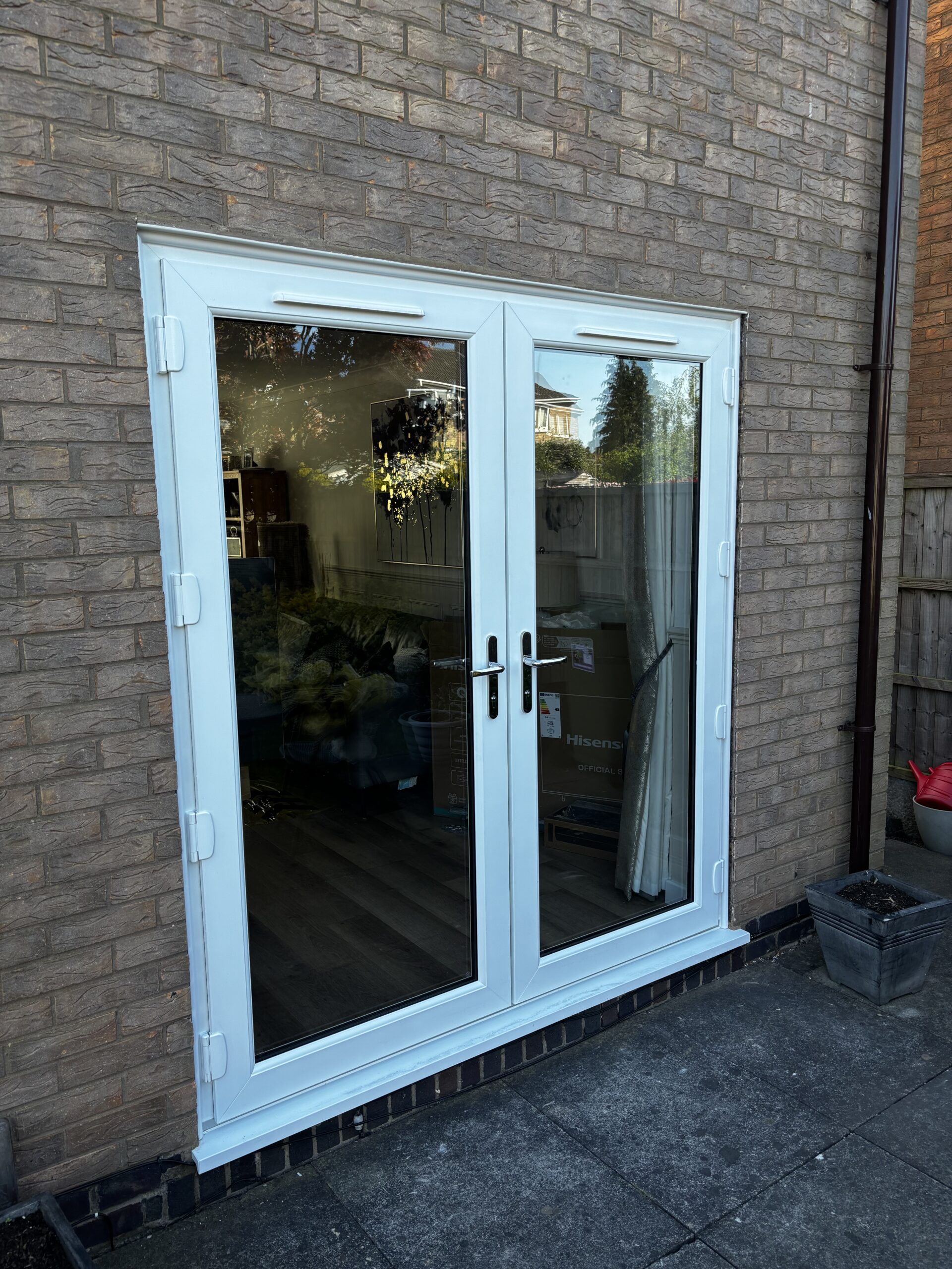 White-uPVC-french-door-installed-in-St-Nicholas-Park-by-Eco-Windows